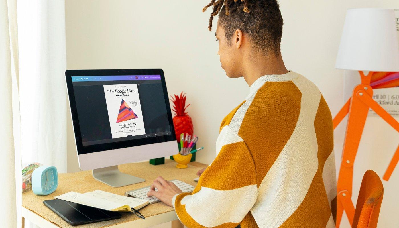 person designing a template on canva